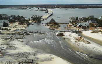 coastal region with colapsed highways and houses demaged by hurricane Sandy